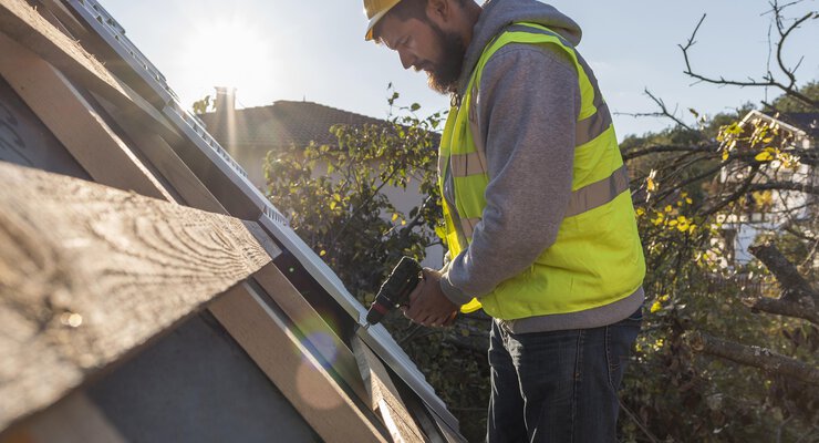 man-working-roof-with-drilljpeg.jpg
